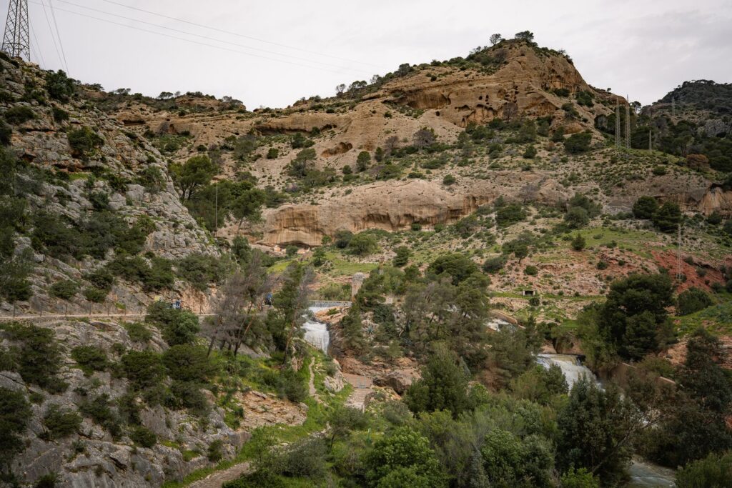 The Guadalhorce valley near the Caminito del Rey is full of cascades, pine woods and sandstone hills