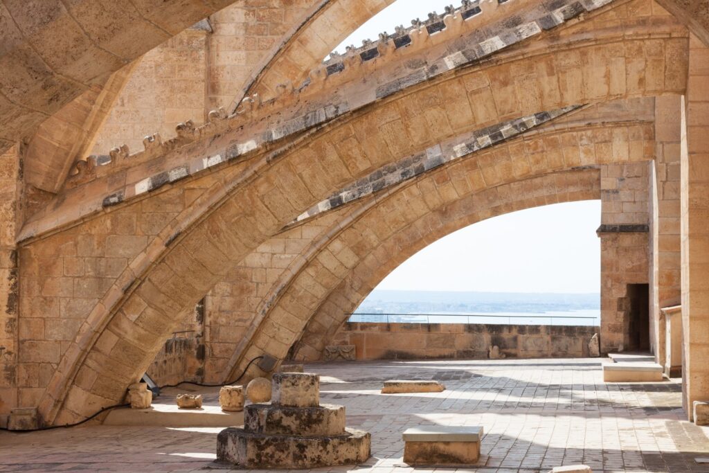 The rooftop terraces take you between the flying buttresses, with the sea beyond.