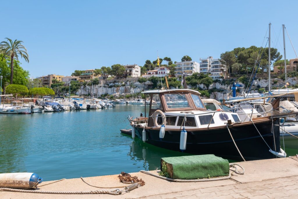 The natural harbour of Porto Cristo is a pleasant lunch stop between the Drach and Hams caves