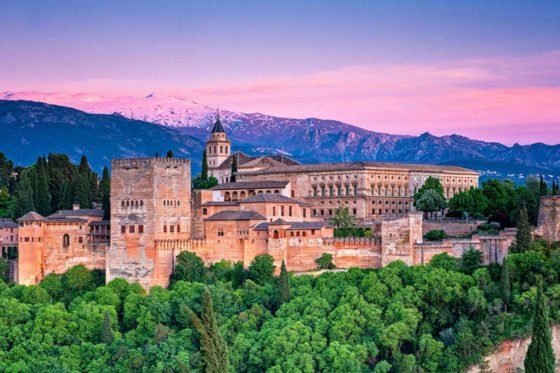 A view of Granada city centre with Sierra Nevada mountains in the background