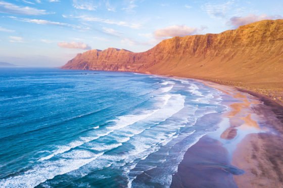 Famara Beach with its golden sand and amazing views