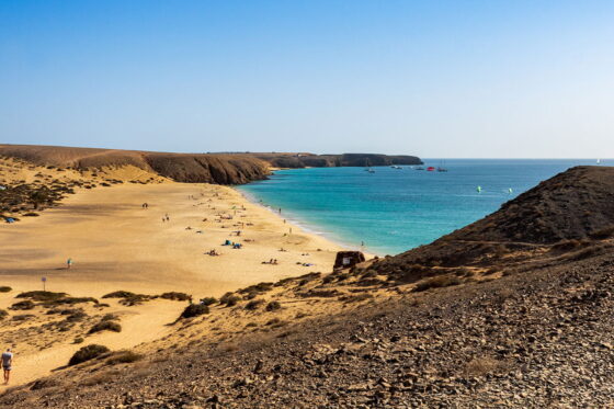 Playa Blanca with its golden beaches and crystal clear waters
