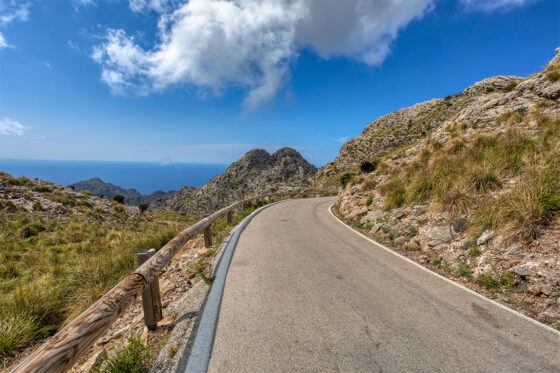A scenic drive along the west coast of Mallorca, with the Serra de Tramuntana mountain range in the background