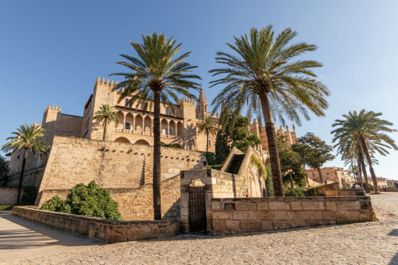 A stunning view of the Royal Palace of La Almudaina, showcasing its rich history and grandeur