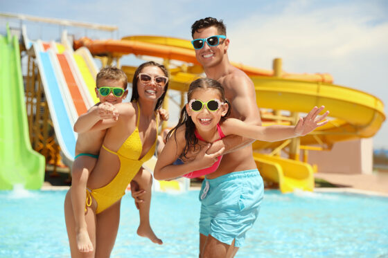 Family enjoyng their time at the pool in water park