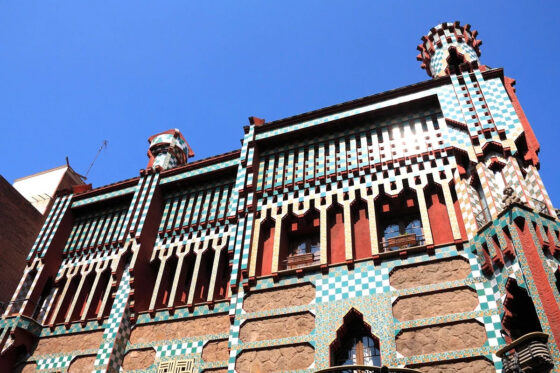 Exterior of Casa Vicens with its facade and balcony overlooking the street
