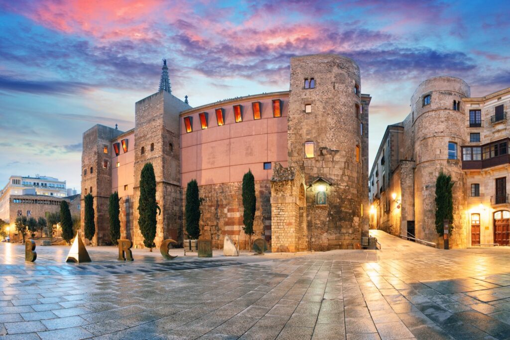 The towers of the Roman gate still guard Plaça Nova next to the cathedral