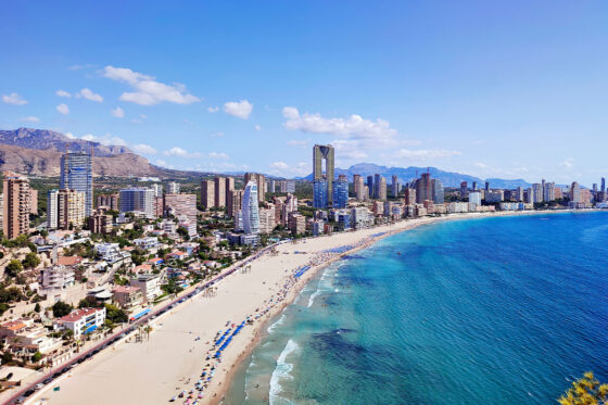 A picture of Tossal de la Cala in Benidorm, Spain, with its golden beaches