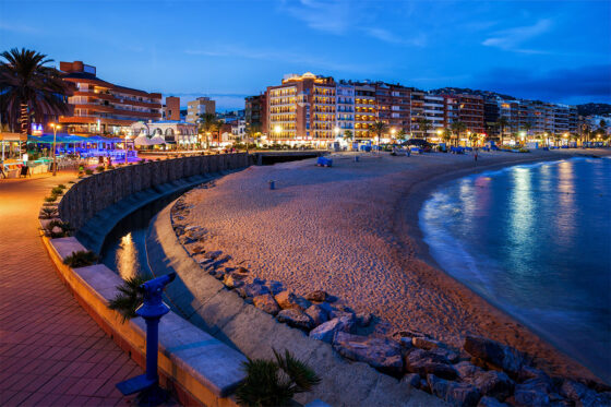 Aerial view of Lloret de Mar's vibrant nightlife with its many beachfront restaurants
