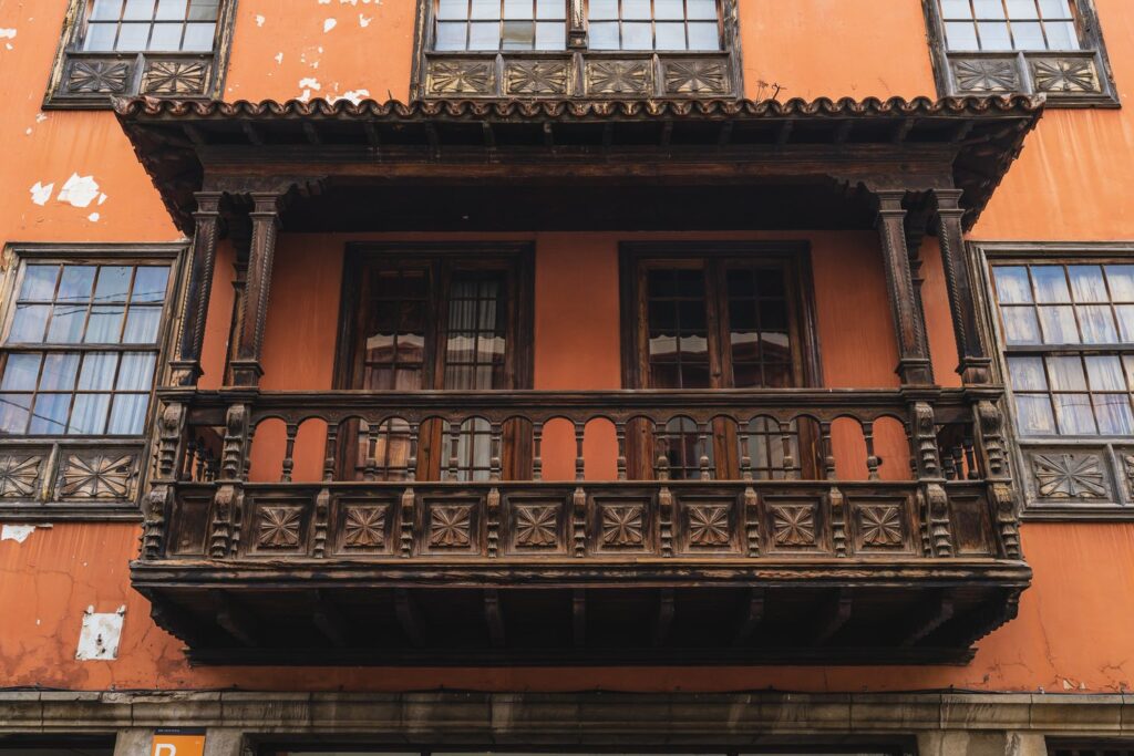 A carved wooden balcony typical of the old mansions of La Orotava