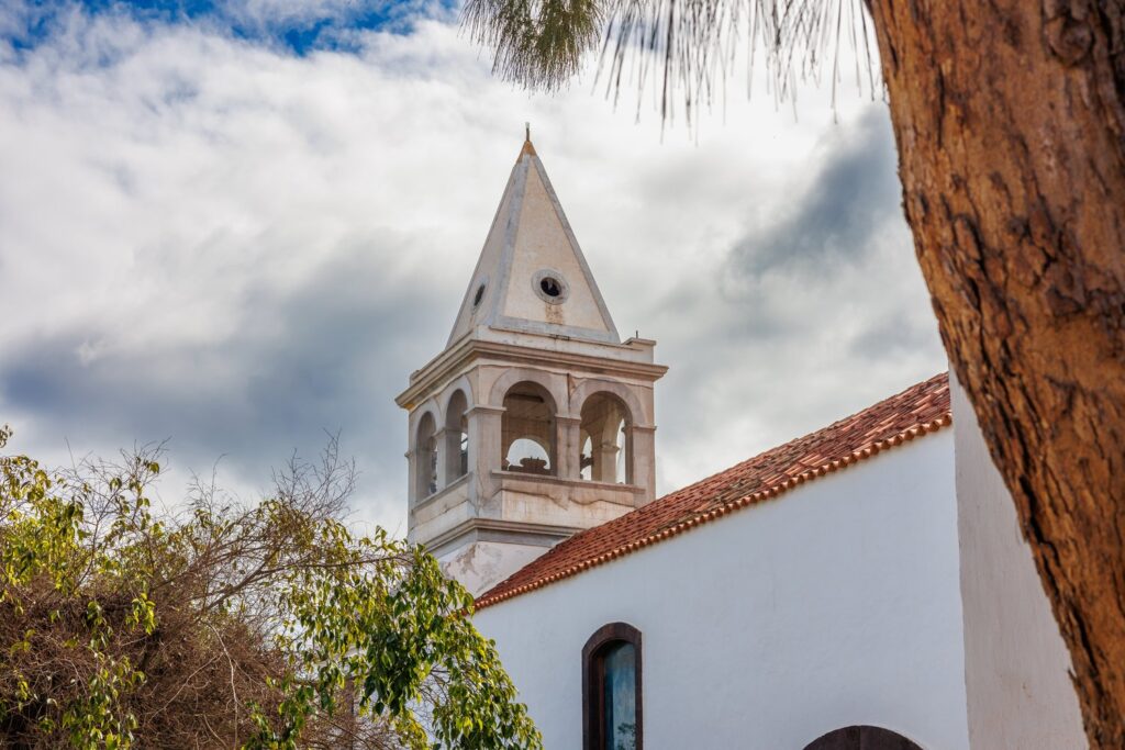 The bell tower of the Church of Our Lady of the Rosary rises above the old heart of Puerto del Rosario