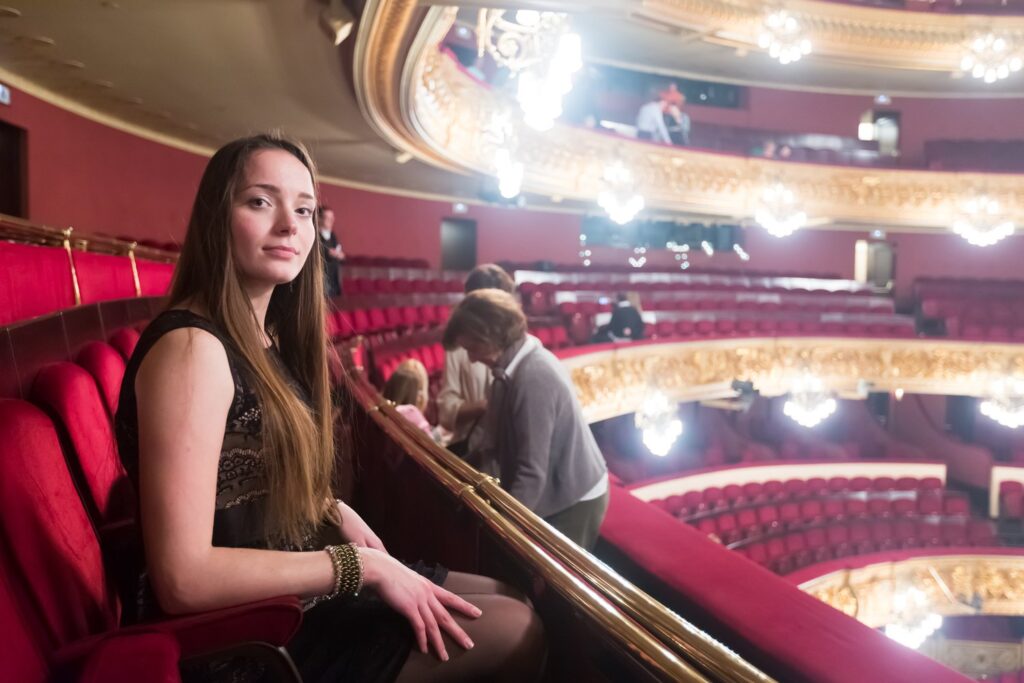 The gilded horseshoe auditorium of the Liceu seats 2,292 people across the stalls and five tiers