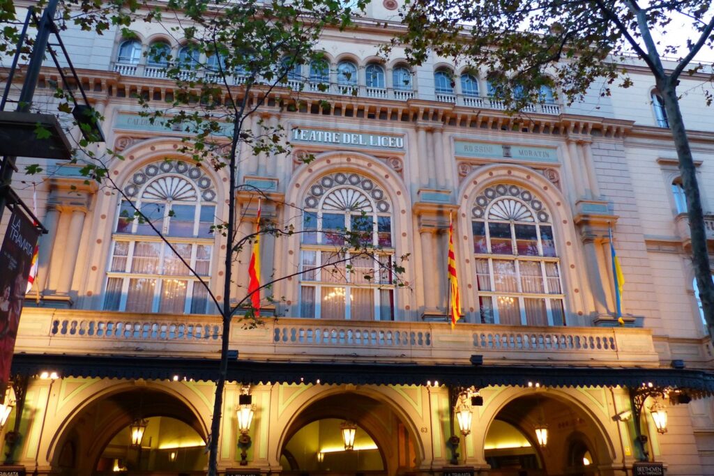 An evening at the Liceu starts on La Rambla, where the façade lights up before the show