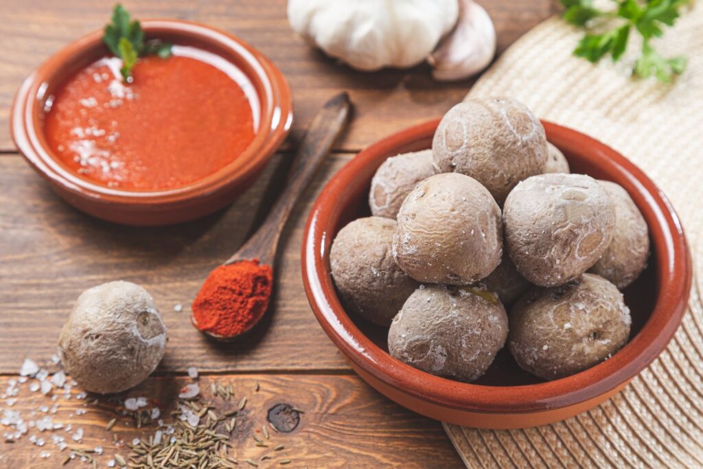 Papas arrugadas with spicy mojo sauce are a must-try Canarian dish in the restaurants of Puerto del Rosario