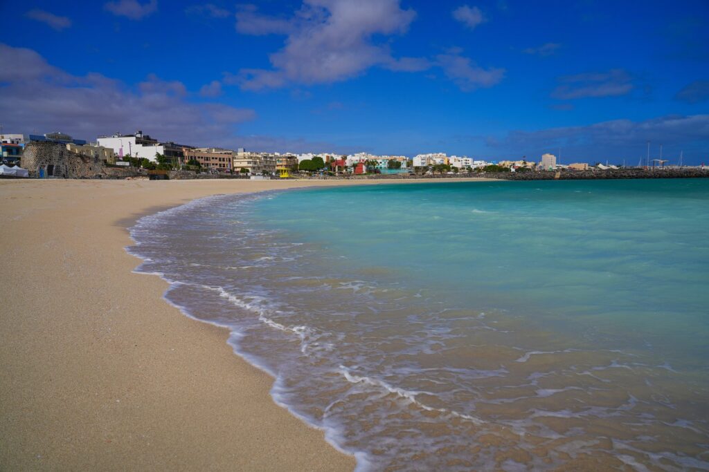 Puerto del Rosario sits on the east coast of Fuerteventura, with its seafront buildings overlooking Playa Chica