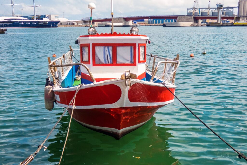 Colourful fishing boats still moor in El Serrallo, the old fishermen's quarter by Tarragona port