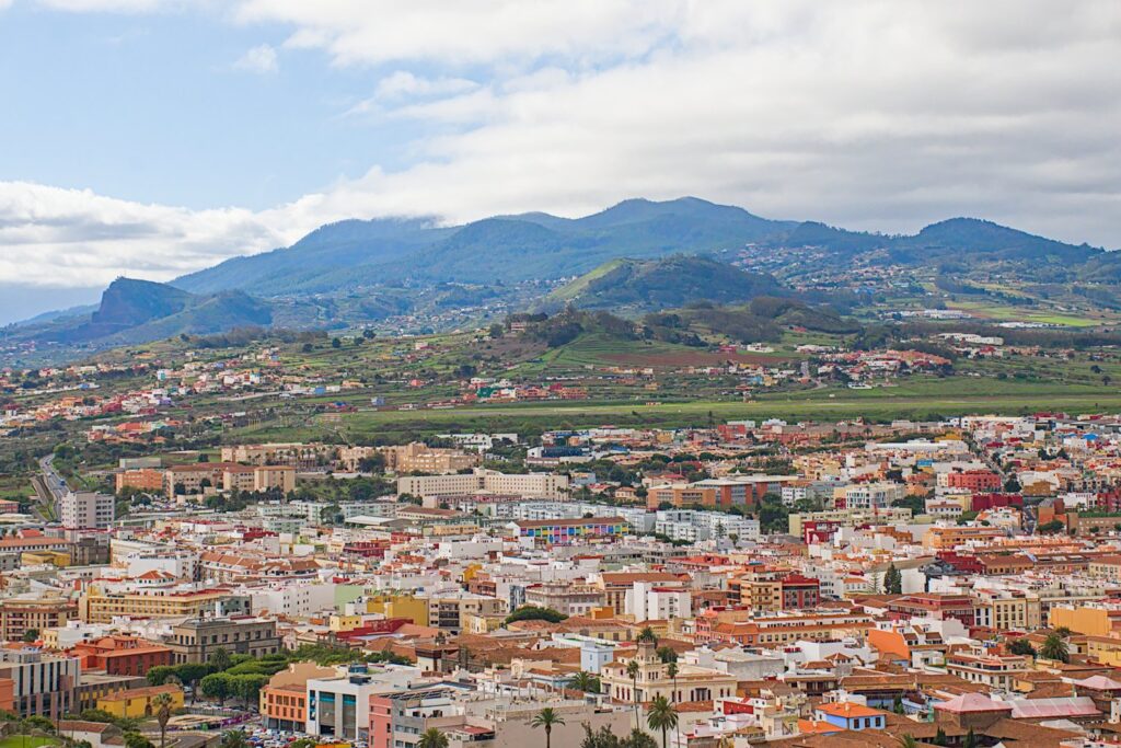 The rooftops of San Cristóbal de La Laguna stretch towards the green Anaga mountains